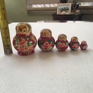 Five piece nesting doll set marked five M
